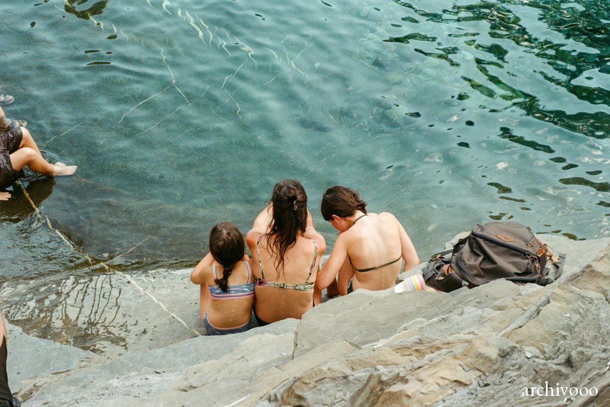 Family on the river bank